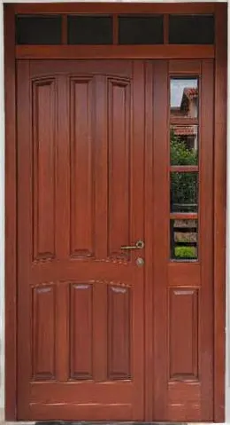 Mahogany-tone entrance door: main leaf with six arched raised panels, glazed side leaf and a four-pane transom